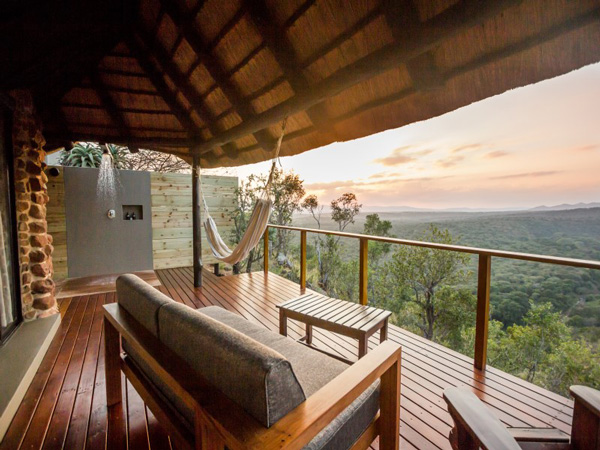 Your own private Chalet deck with outdoor shower at Leopard Mountain Game Lodge located in the Manyoni Private Game Reserve