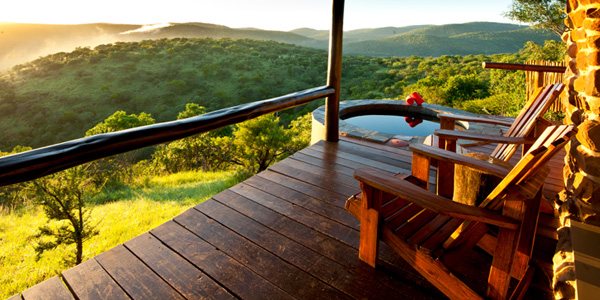 Your own private Chalet deck during sunset at Leopard Mountain Game Lodge located in the Manyoni Private Game Reserve