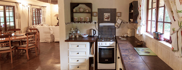 The Cottage, Kitchen and Dining area at Rhino River Lodge in the Manyoni Private Game Reserve (previously the Zululand Rhino Reserve), KwaZulu-Natal